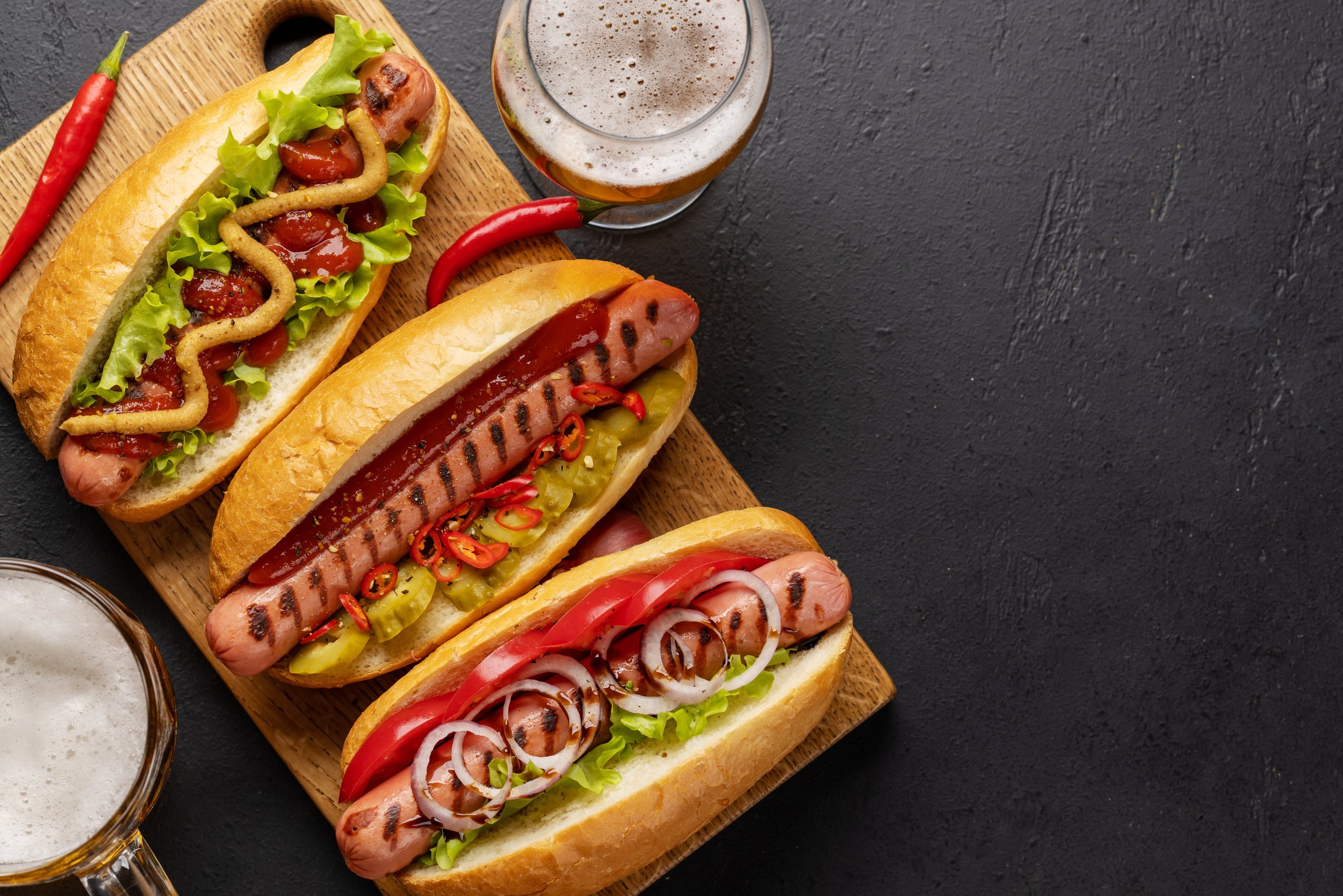 Various hot dog and beer