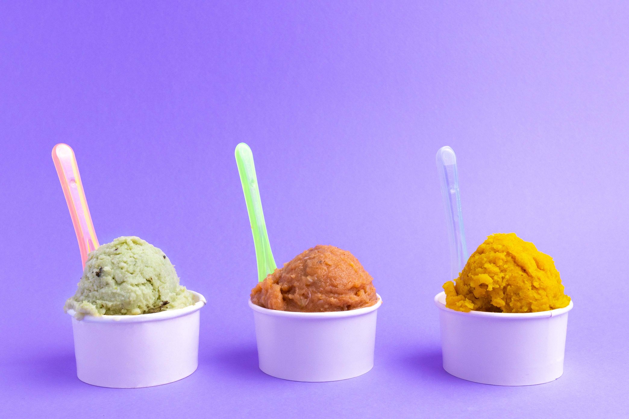 Different Flavors of Ice Cream in Paper Cups 